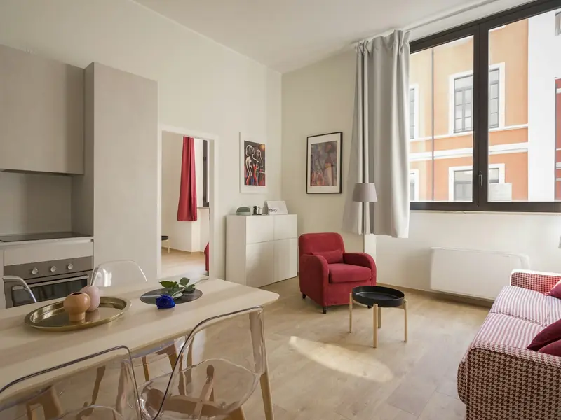Bright, tidy apartment living and dining area